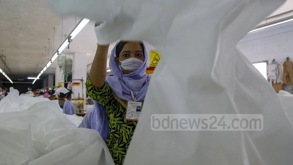 uploads/trade_daily/digest_photo_bdnews24_2023-01_5379fcca-e45e-43fe-a407-320578f213bc_ppe_manufacture_010420_18__1674625072.jpg